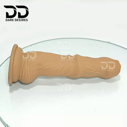 7.5 inch dildo with balls in a natural brown tone, with detailed veins along the shaft and a realistic tip. It has a 6 inch insertable length and a 5 inch girth. buy dildo online in India at DarkDesires