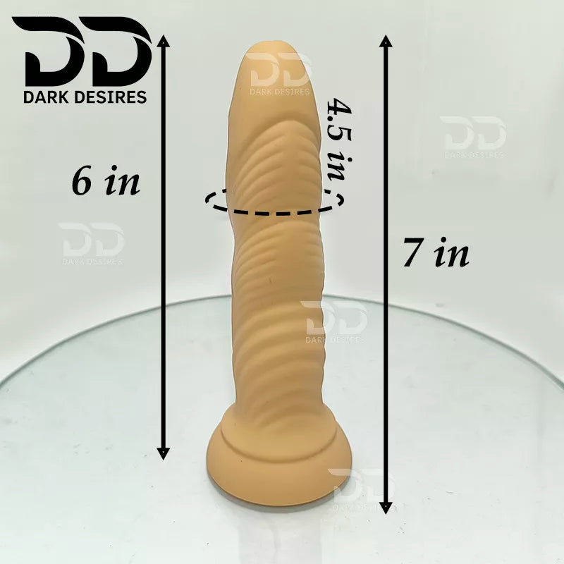 DarkDesires Textured Touch is a 7 inch textured dildo in a natural skin tone, with a detailed shaft and a smooth rounded tip. It is 7 inches long with a 6 inch insertable length and a 4.5 inch girth, so it is a medium size that works for G-spot, vaginal, and anal dual stimulation. Buy dildo online in India at DarkDesires