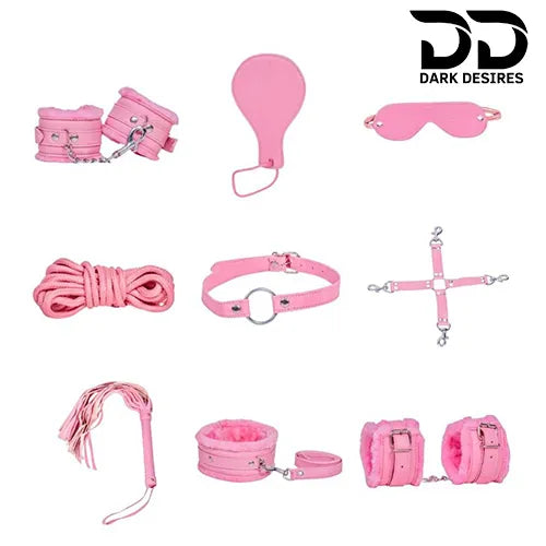 Collection of pink items including a cotton rope, eye mask, cross strap, hand cuff, flogger, paddle, ring gag, leg cuff, and collar & leash with BDSM Couple 9 piece red bondage roleplay set India by Darkdesires