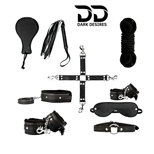 Collection of black items including a cotton rope, eye mask, cross strap, hand cuff, flogger, paddle, ring gag, leg cuff, and collar & leash with BDSM Couple 9 piece red bondage roleplay set India by Darkdesires