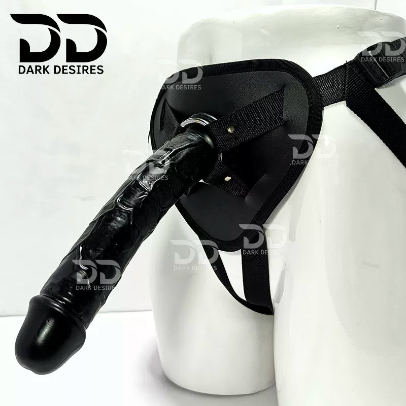 Black harness-style restraint device  9 inch realistic premium strapon dildo with adjustable harness kit for  for pegging . Lifelike veins, black tone, soft glans.  Black faux leather belt Sex Toys for Women in Mumbai India by DarkDesires