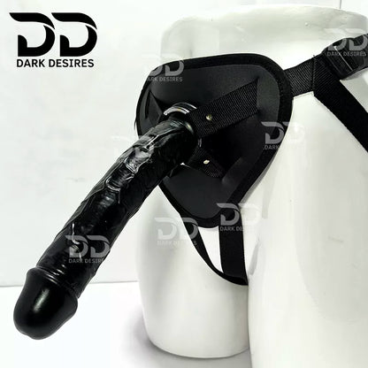 Black harness-style restraint device  9 inch realistic premium strapon dildo with adjustable harness kit for  for pegging . Lifelike veins, black tone, soft glans.  Black faux leather belt Sex Toys for Women in Mumbai India by DarkDesires