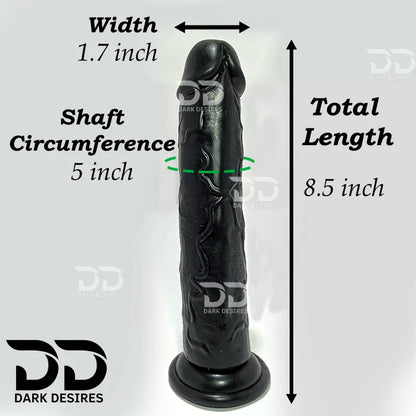 Black realistic dildo shown with overlaid dimension arrows and text indicating width 1.7 inch, shaft circumference 5 inch, and total length 9 inch .  9 inch realistic strapon dildo with adjustable harness kit for  for pegging . Lifelike veins, black tone, soft glans.  Black faux leather belt Sex Toys for Women in Mumbai India by DarkDesires
