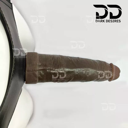 A realistic brown-toned dildo with a black harness-style base Black faux leather harness with an adjustable strap and a brown tone realistic dildo displayed 8 inch realistic strapon dildo with adjustable harness kit with balls for pegging . Lifelike veins, brown tone, soft glans.  Black faux leather belt Sex Toys for Women in Mumbai India by DarkDesires