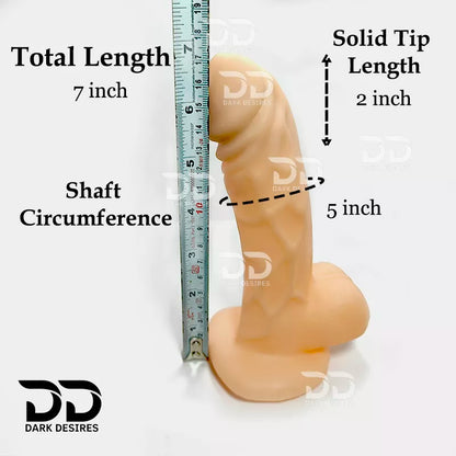  measurement annotations: total length 7 inches, shaft circumference 5 inches, and solid tip length 2 inches, alongside a ruler for scale. The product is a flesh-toned dildo with a realistic textured shaft and base. hollow strapon  dildo penis sleeve extender. Adds girth and length, works pre and post-erection, harness compatible dark chocolate flesh tone color Buy Hollow Strapon dildo in India byDarkDesires